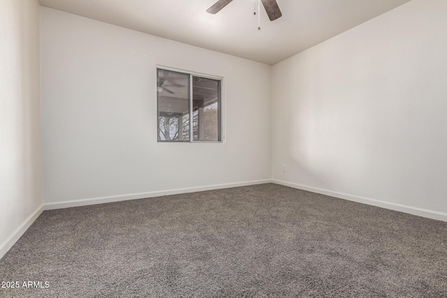 empty room with baseboards, a ceiling fan, and carpet flooring