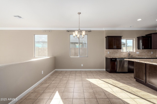 23789 W Chipman Rd, Buckeye, AZ 85326 - kitchen featuring tasteful backsplash, visible vents, a notable chandelier, dark brown cabinetry, and stainless steel dishwasher