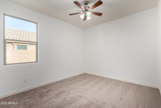 23789 W Chipman Rd, Buckeye, AZ 85326 - unfurnished room featuring baseboards, a ceiling fan, and carpet