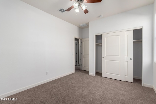 23789 W Chipman Rd, Buckeye, AZ 85326 - unfurnished bedroom featuring a closet, carpet flooring, visible vents, and baseboards