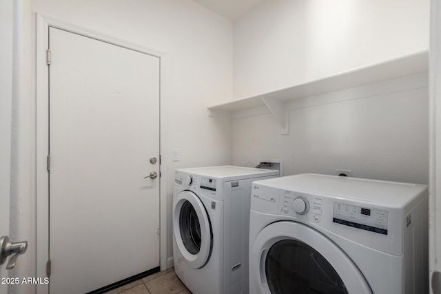 23789 W Chipman Rd, Buckeye, AZ 85326 - laundry area with light tile patterned floors, washer and dryer, and laundry area