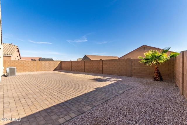 23789 W Chipman Rd, Buckeye, AZ 85326 - view of yard with central AC, a fenced backyard, and a patio area