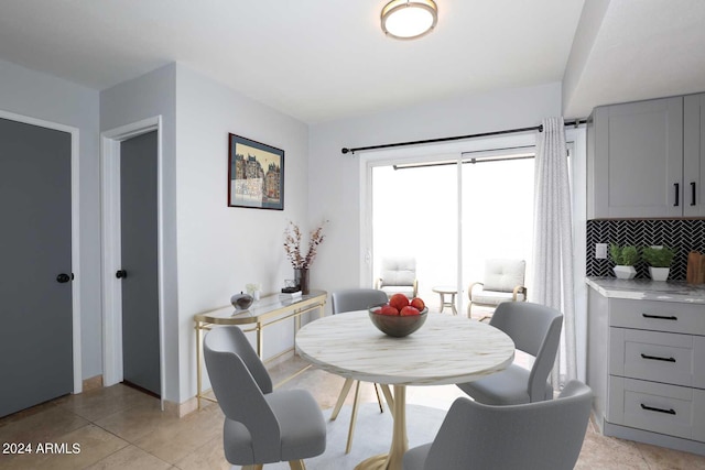 7331 E Valley Vista Dr, Scottsdale, AZ 85250 - dining space featuring light tile patterned flooring and baseboards