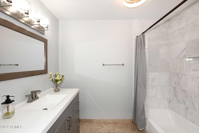 bathroom with shower / bath combo with shower curtain and vanity