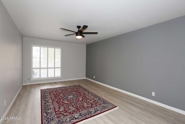 unfurnished room featuring ceiling fan and light wood-type flooring