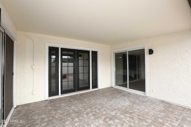 view of patio / terrace featuring french doors