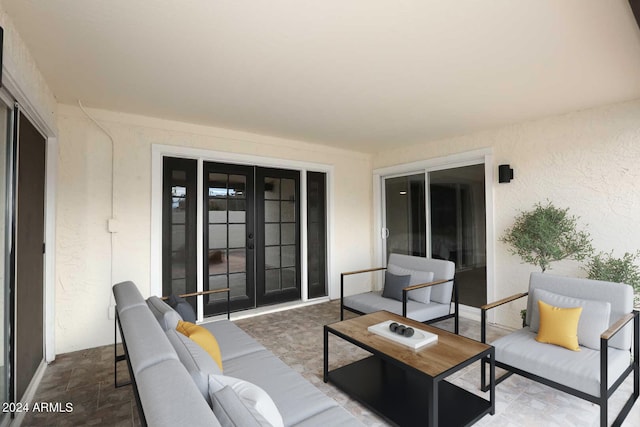 view of patio / terrace with french doors and an outdoor hangout area