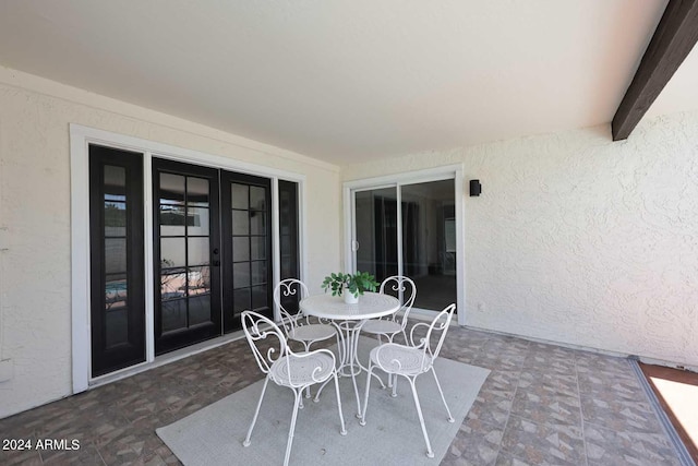 view of patio featuring french doors