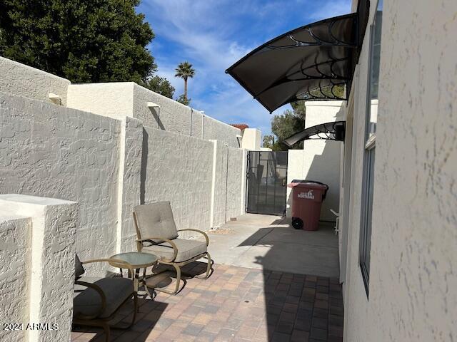 7331 E Valley Vista Dr, Scottsdale, AZ 85250 - view of patio / terrace with a gate