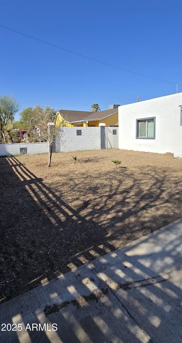 exterior space with fence