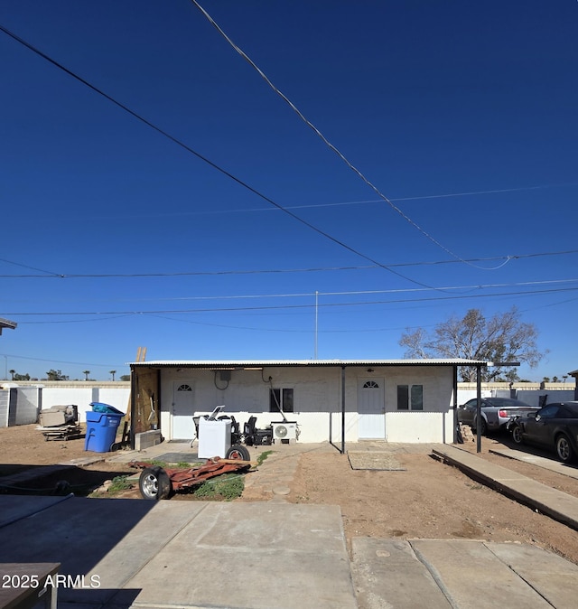 view of front of property with fence