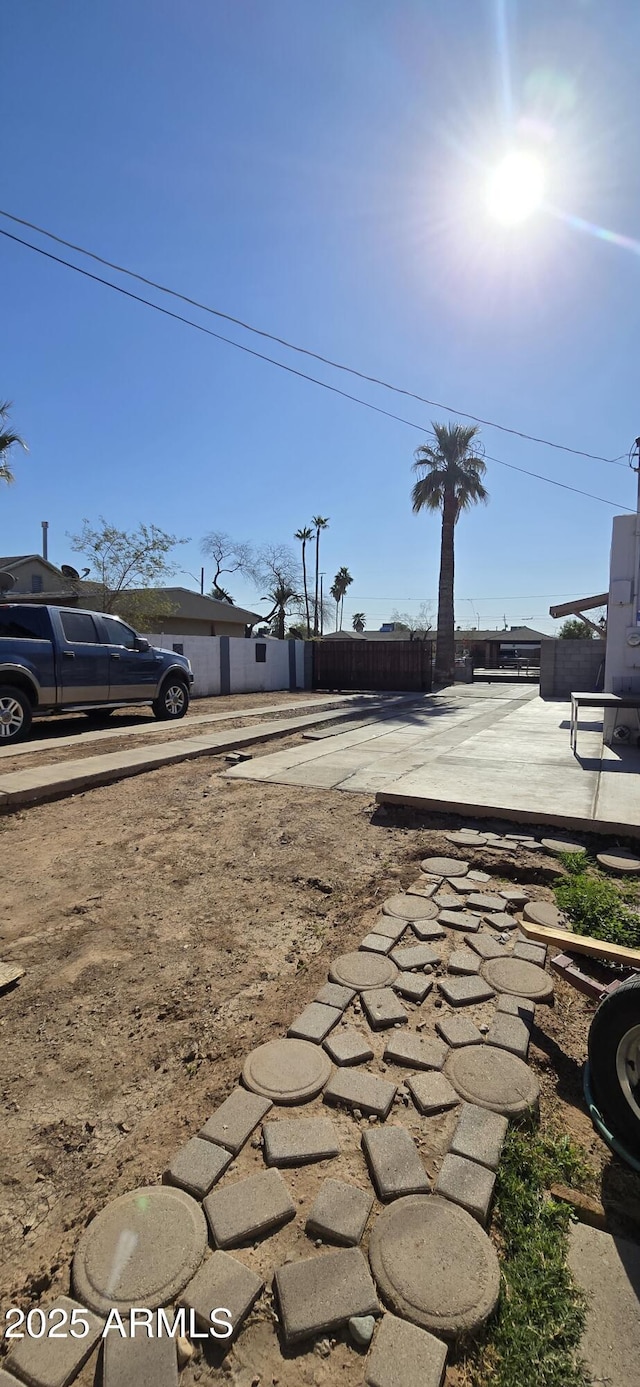 view of yard with a patio area and fence