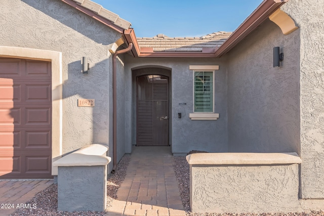 entrance to property with a garage