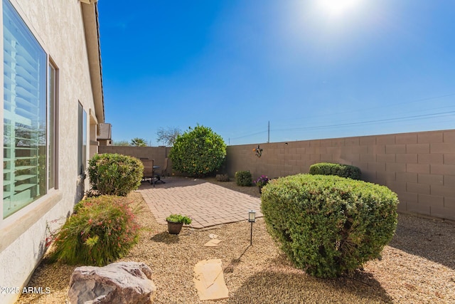 view of patio featuring a fenced backyard