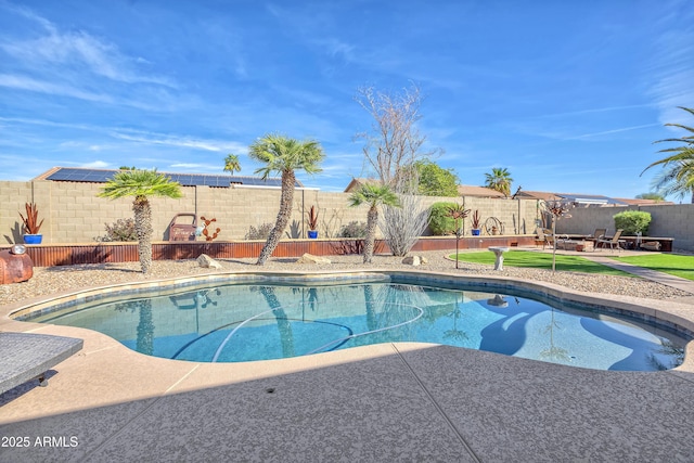 view of pool featuring a fenced in pool, a patio, and a fenced backyard