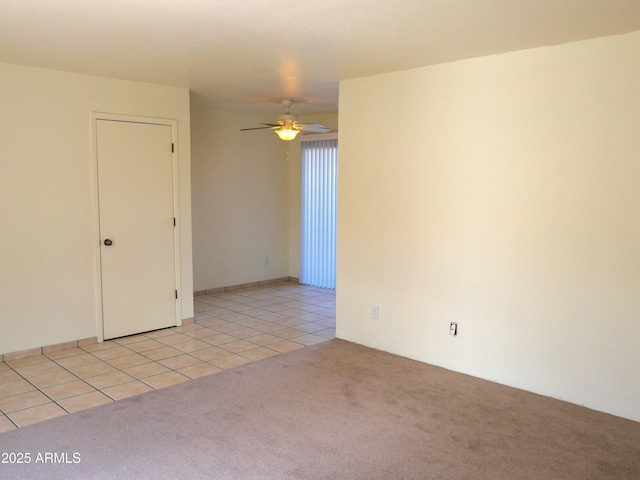 4359 Avenida Palermo Unit C, Sierra Vista, AZ 85635 - unfurnished room featuring a ceiling fan, light colored carpet, and light tile patterned floors