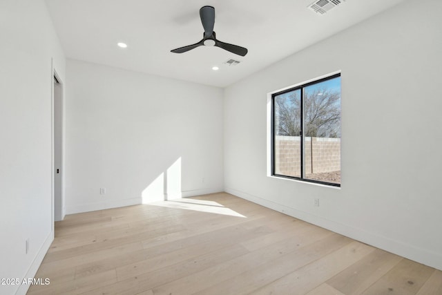 empty room with recessed lighting, visible vents, baseboards, light wood-type flooring, and ceiling fan