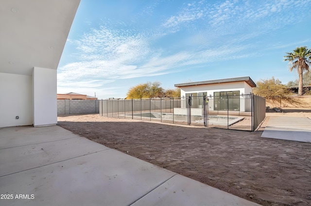 view of yard with a patio area and a fenced backyard