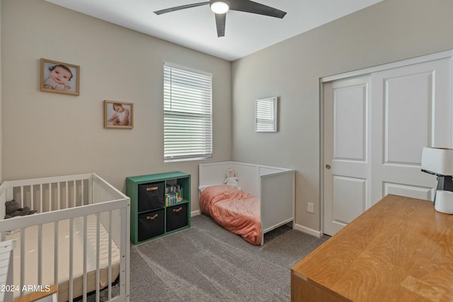 bedroom featuring carpet floors, a closet, and ceiling fan