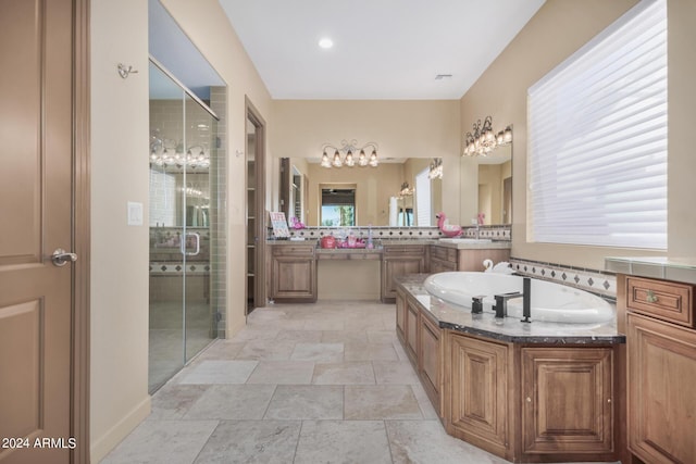 bathroom featuring vanity and plus walk in shower