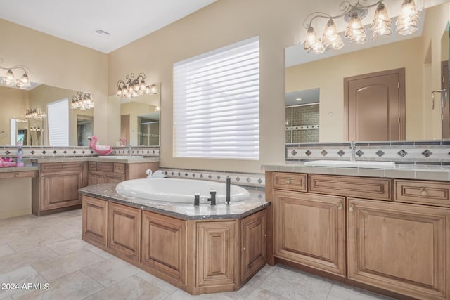 bathroom featuring separate shower and tub, decorative backsplash, and vanity