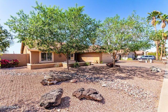 2753 E Kenwood St, Mesa, AZ 85213 - view of front facade with driveway, stucco siding, an attached garage, and a tile roof