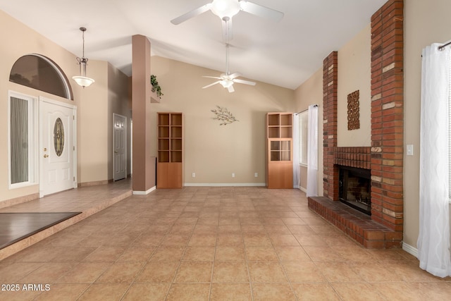 2753 E Kenwood St, Mesa, AZ 85213 - unfurnished living room featuring high vaulted ceiling, light tile patterned floors, a brick fireplace, and ceiling fan