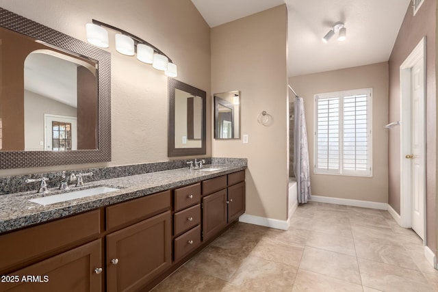 2753 E Kenwood St, Mesa, AZ 85213 - bathroom featuring a sink, double vanity, and a healthy amount of sunlight