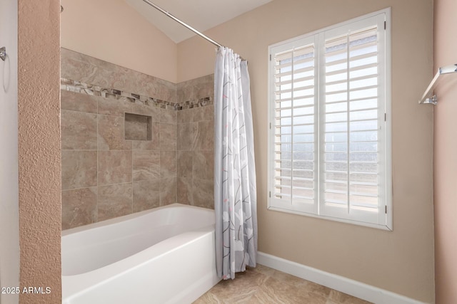 2753 E Kenwood St, Mesa, AZ 85213 - bathroom featuring shower / bath combo, baseboards, and tile patterned floors