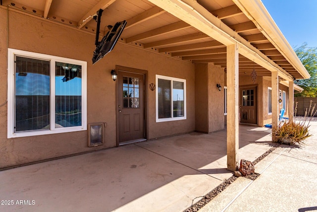 2753 E Kenwood St, Mesa, AZ 85213 - doorway to property featuring a patio and stucco siding