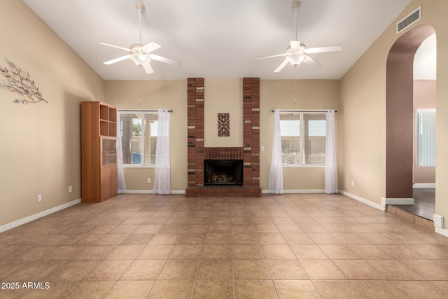 2753 E Kenwood St, Mesa, AZ 85213 - unfurnished living room featuring visible vents, vaulted ceiling, and ceiling fan