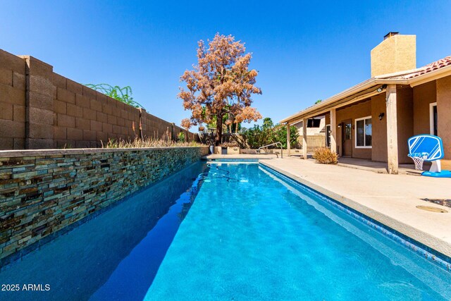 2753 E Kenwood St, Mesa, AZ 85213 - view of swimming pool with a patio area, a fenced backyard, and a fenced in pool