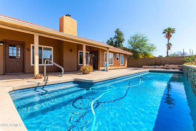 2753 E Kenwood St, Mesa, AZ 85213 - view of swimming pool featuring a fenced in pool, a patio area, and fence
