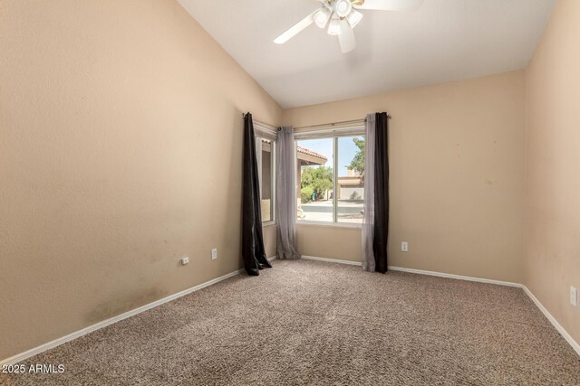 2753 E Kenwood St, Mesa, AZ 85213 - carpeted spare room with baseboards, a ceiling fan, and vaulted ceiling
