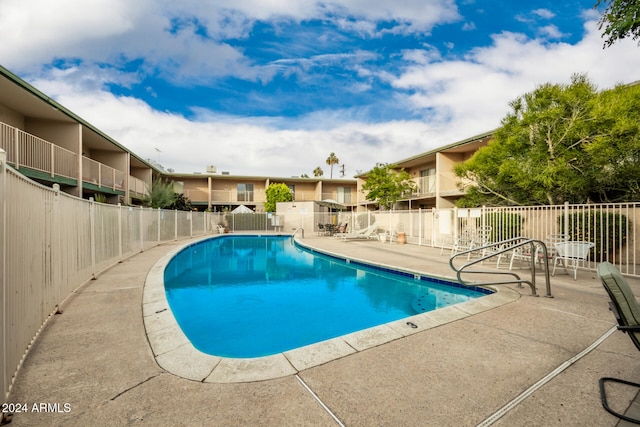 view of pool featuring a patio area