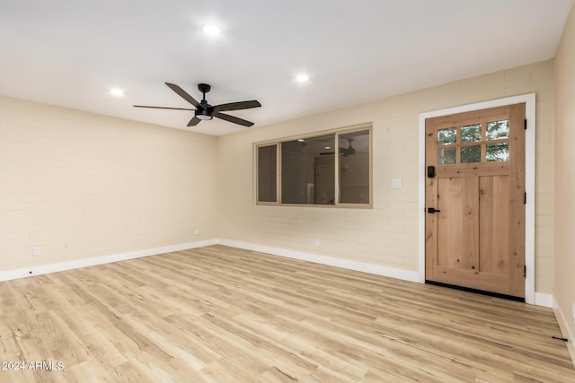 interior space featuring ceiling fan and light wood-type flooring