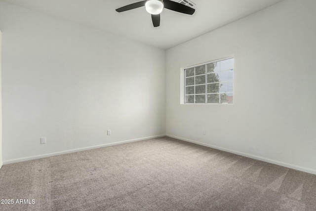 carpeted empty room with ceiling fan