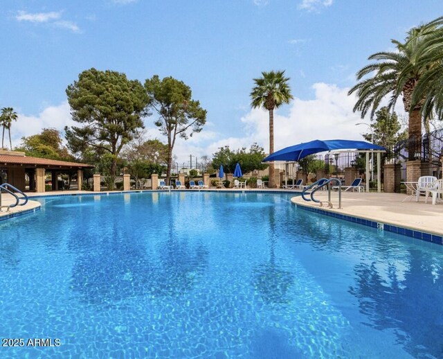 1833 W Citrus Way, Phoenix, AZ 85015 - community pool featuring a patio area