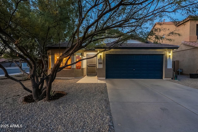 view of front of property featuring a garage