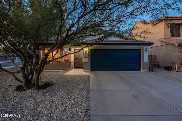 view of front of home featuring a garage