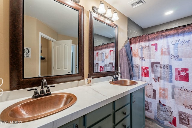 bathroom with a shower with curtain and vanity