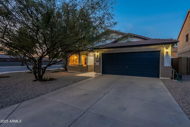 view of front of property featuring a garage