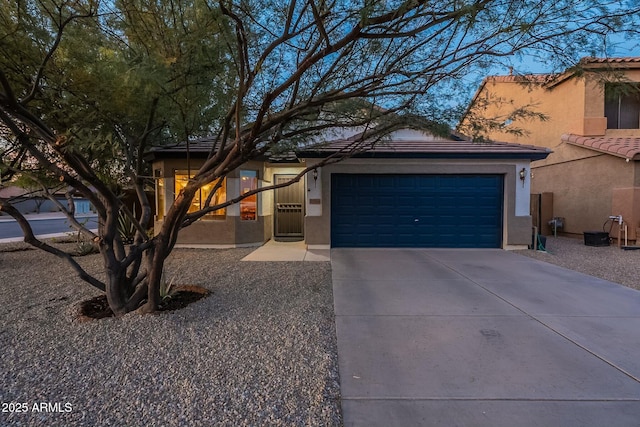 view of front of home with a garage