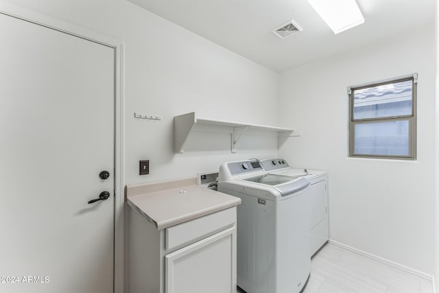 clothes washing area featuring washing machine and clothes dryer