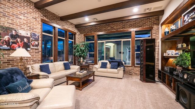 living room featuring beamed ceiling, brick wall, a towering ceiling, and carpet floors