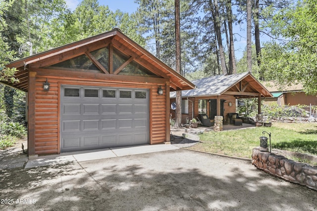 garage featuring driveway