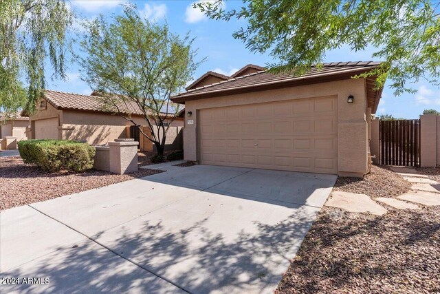 view of front of property featuring a garage