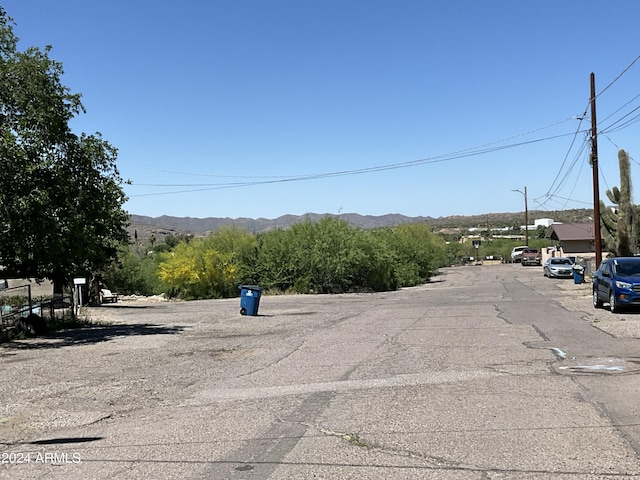 view of street featuring street lighting and a mountain view