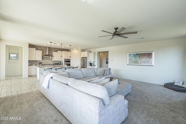 living room featuring ceiling fan