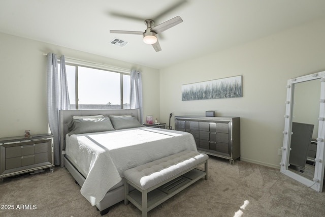 bedroom with light carpet and ceiling fan